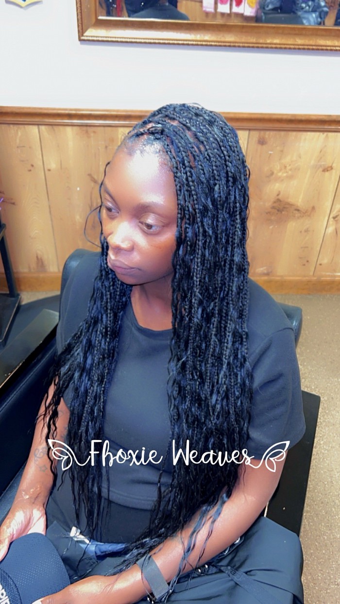 Goddess knotless braids with human hair curls